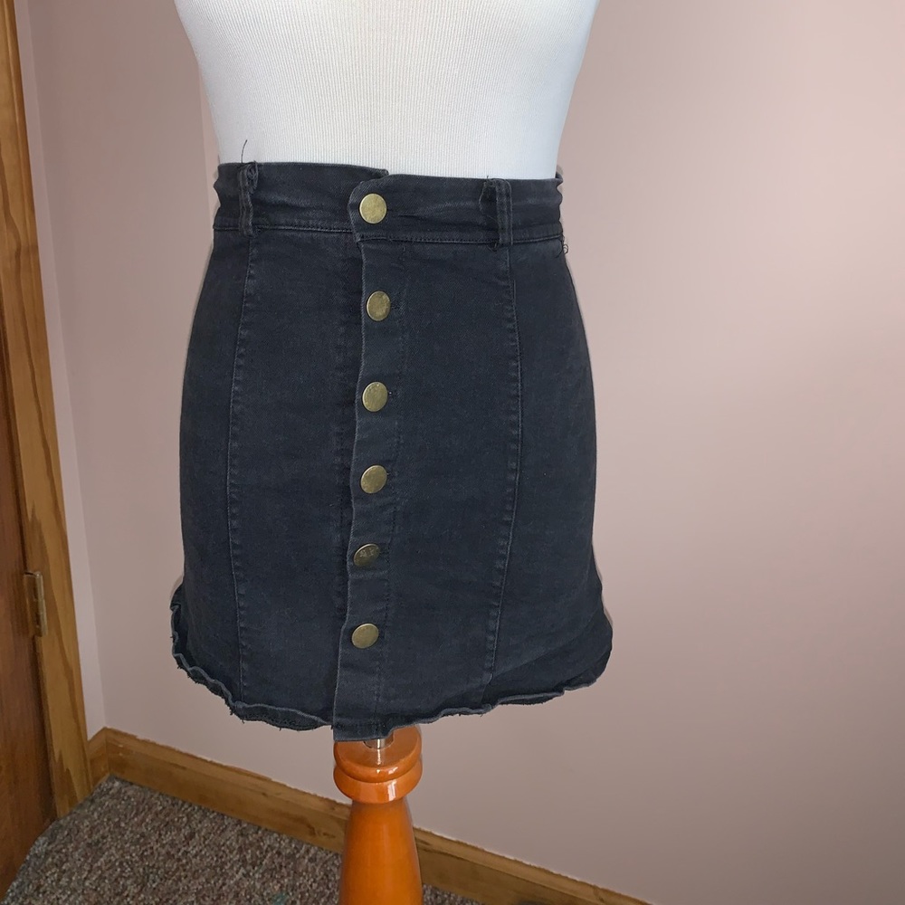 Black denim skirt with buttons down the middle